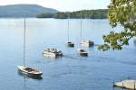 Sailboats moored on Lake George