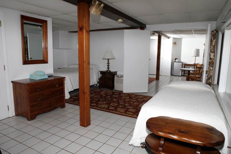 Lakeshore Suite room with beds and tiled floor