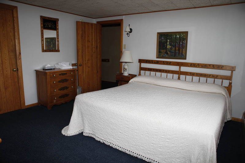 Adirondack Main Lodge room with queen bed