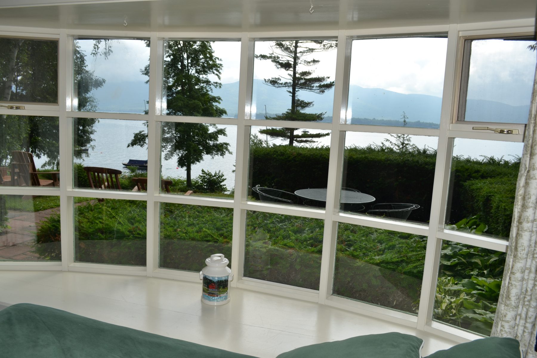 Looking out through large window to Lake George